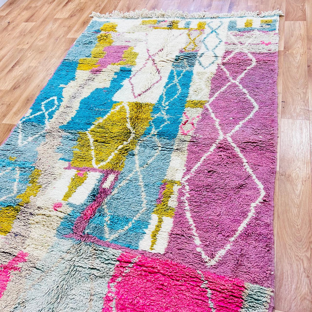 Vintage Moroccan wool rug with pastel geometric Berber pattern in pink, blue and beige