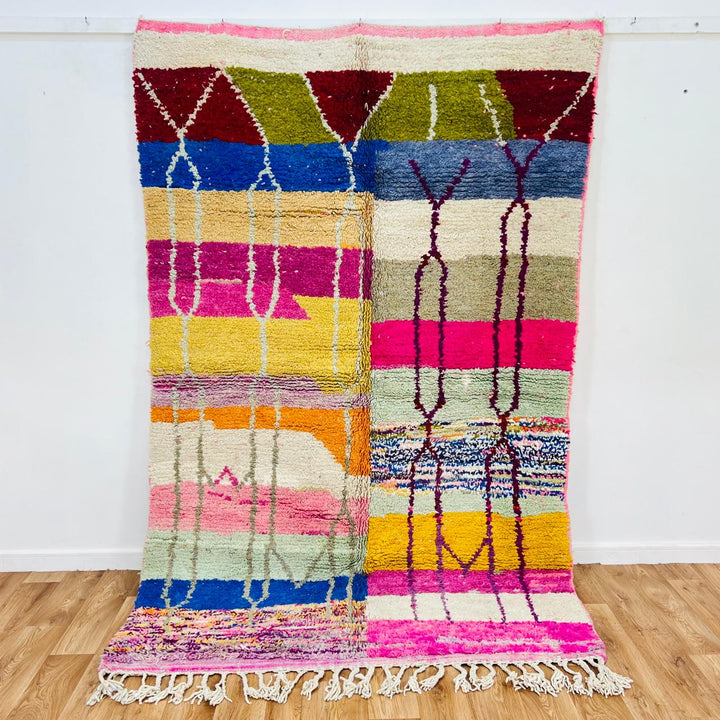 Vintage Moroccan Berber wool rug with colorful geometric patchwork pattern