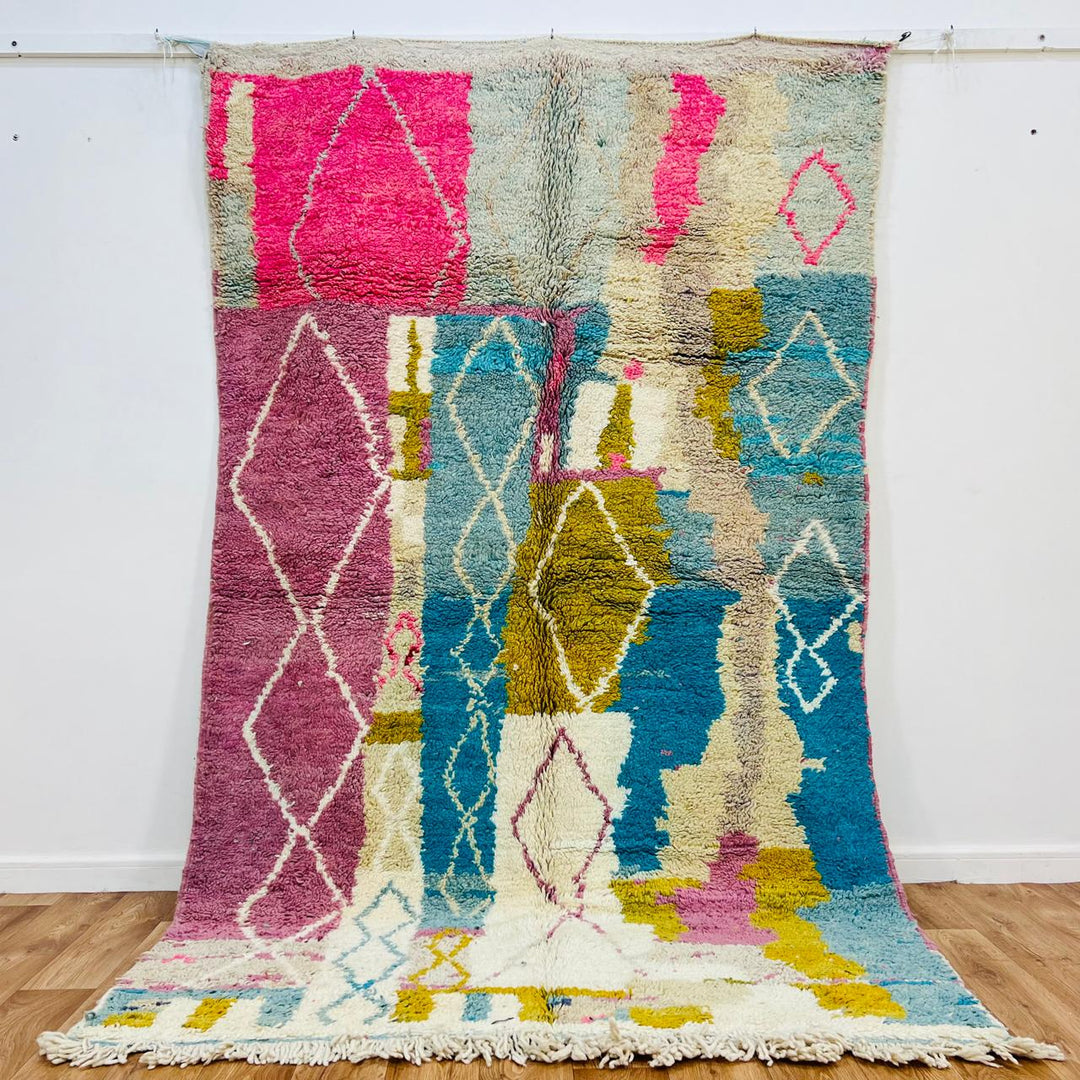 Vintage Moroccan wool rug with pastel geometric Berber pattern in pink, blue and beige