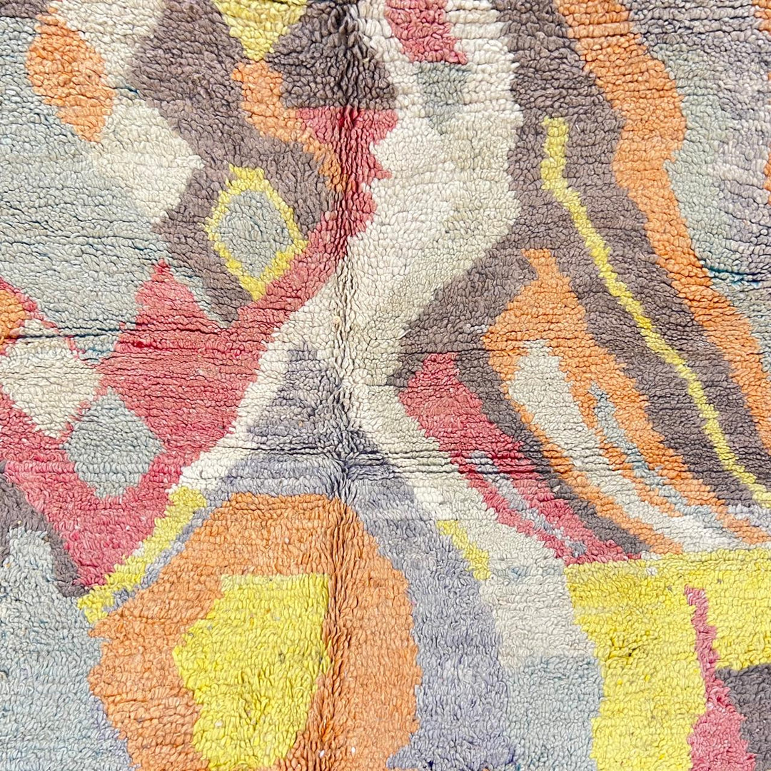 Vintage Moroccan wool rug 396 – handmade abstract earth tone design with yellow, coral, and beige pattern (256 × 148 cm).